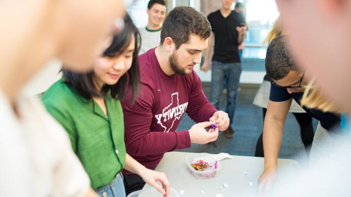 Students counting Valentine's Day treats